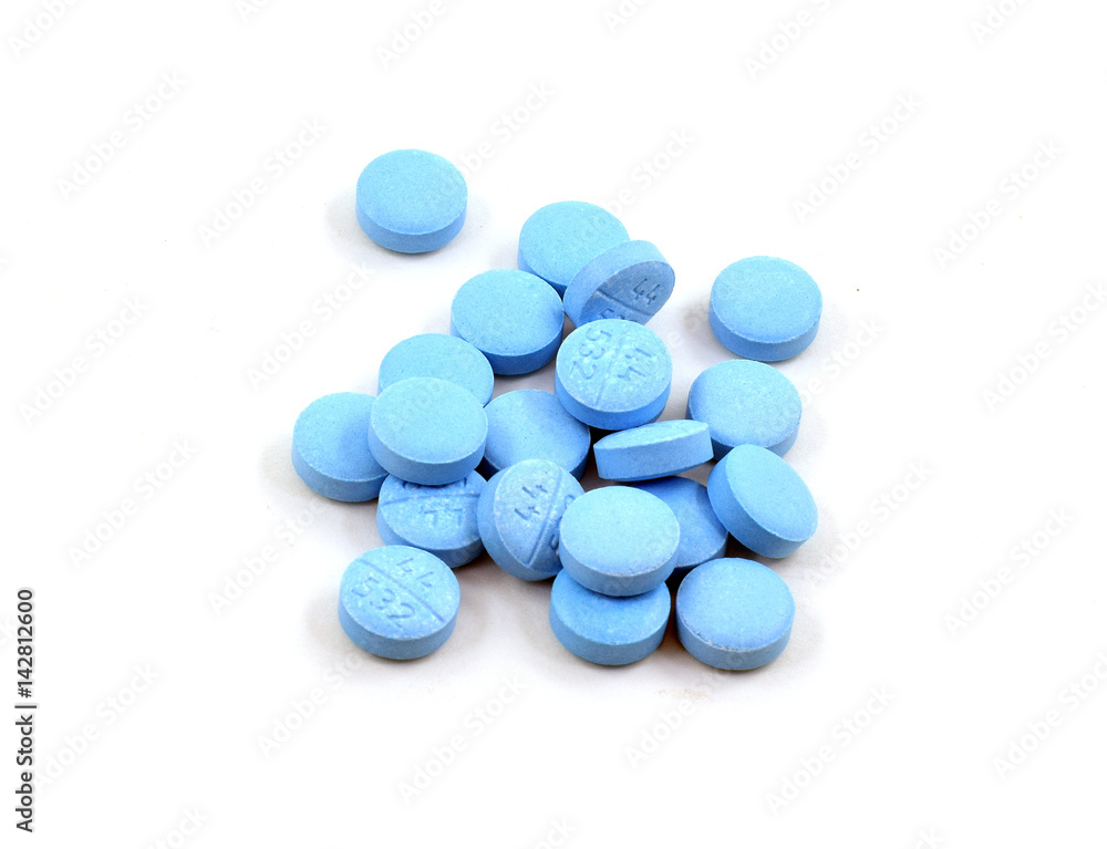 Pile of light blue pills