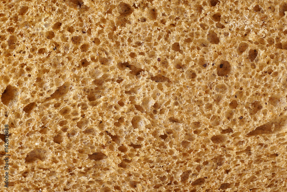 The surface of bread from dark wheat varieties.