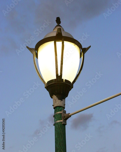 Postlight against a dark sky photo