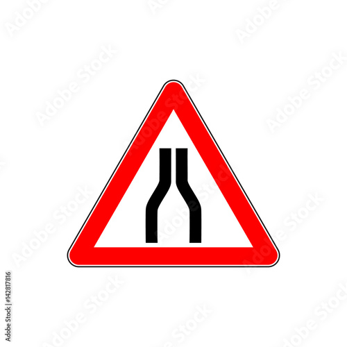 Road narrows on both sides