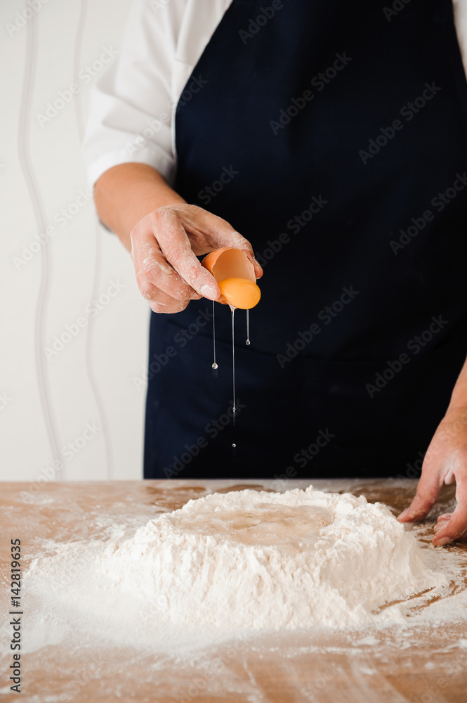 Chef preparing dough - cooking process Chef preparing dough - cooking process