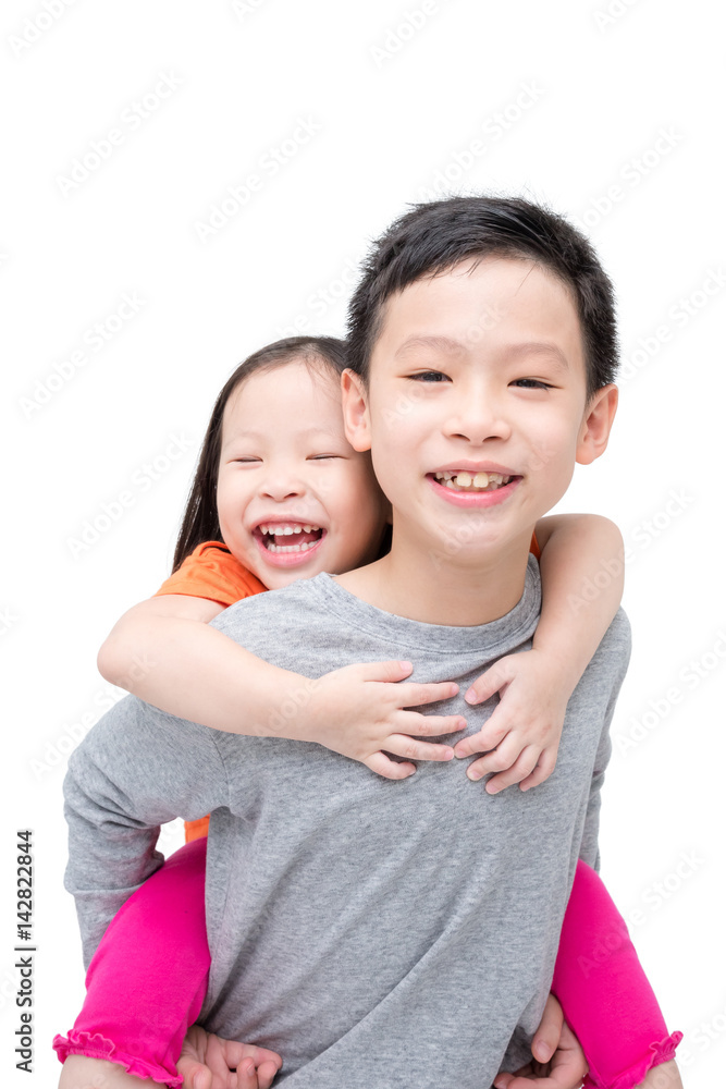 Happy Asian sibling isolated over white background Happy Asian sibling isolated over white background