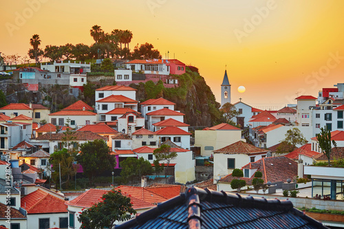 Scenic aerial view of Camara de Lobos village, Madeira photo