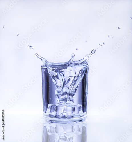 ice cube into a glass of water