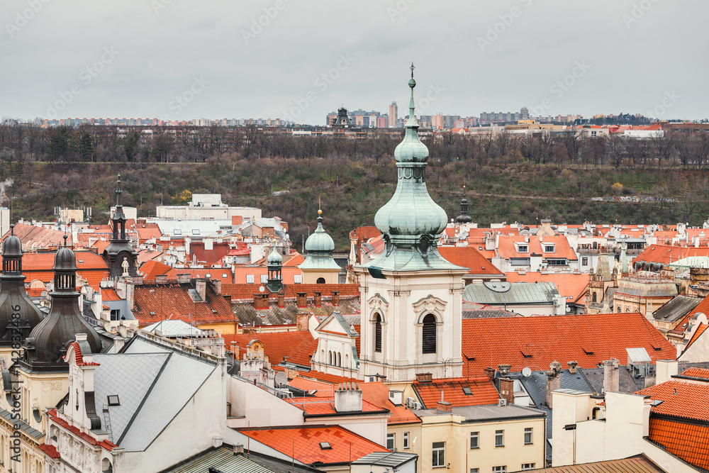 Aerial view on the red roofs of old European town Prague