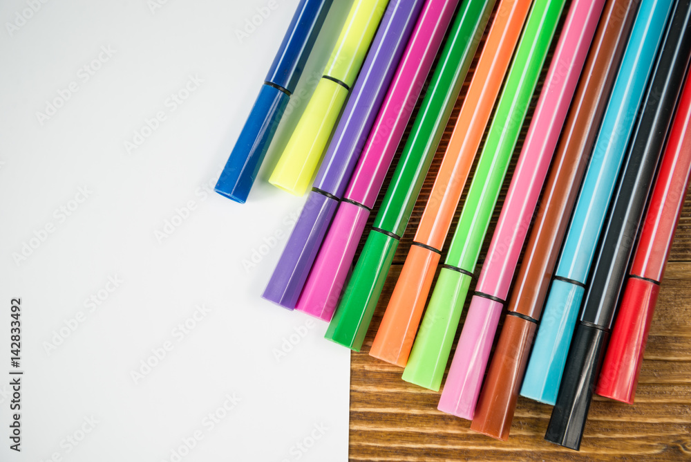 Fototapeta premium clean sheets on table with markers