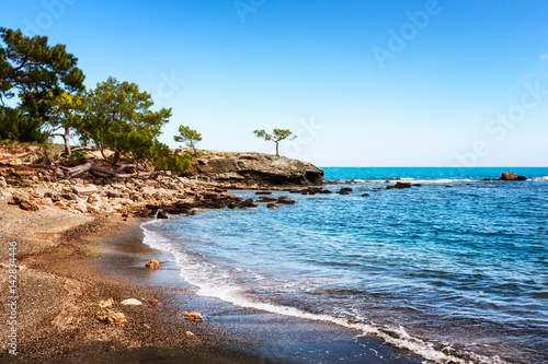 Beach and ruins at Phaselis town Turkey photo