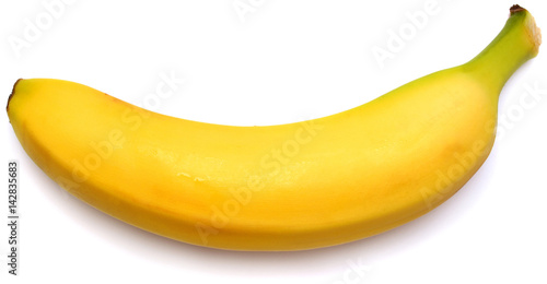 Single banana against white background. Flat lay, top view