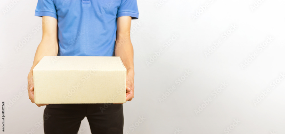 shopping online and order concept,male postal delivery courier man delivering package on white background for banner your can ad text for advertising shopping online and order concept,male postal delivery courier man delivering package on white background for banner your can ad text for advertising