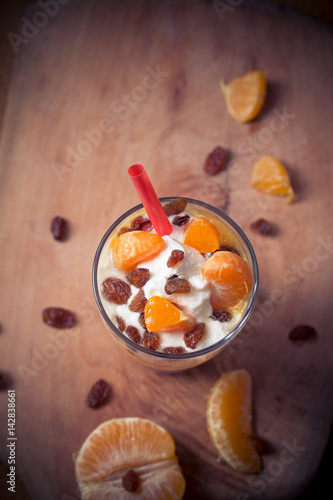 Fresh fruit mandarin yoghurt and raisins
