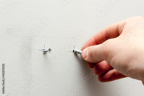 drilling hole in a wall