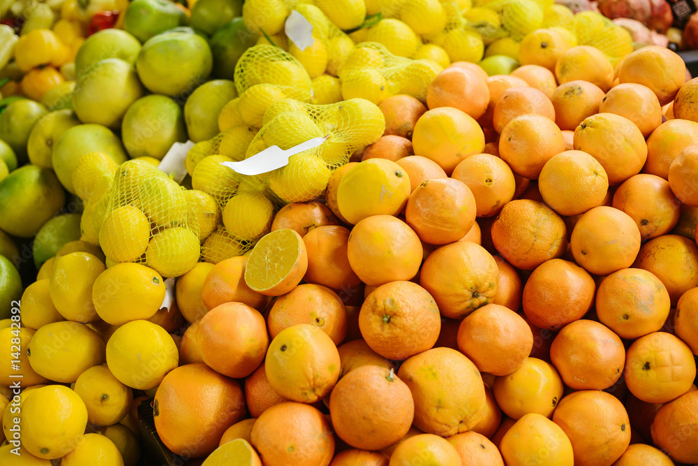 Citrus mix from fresh lemon, orange, sweetie, sweety, pomelo on the farm market. Products rich in vitamins. Natural local products on the farm market. Harvest. Seasonal products. Food. Citrus mix from fresh lemon, orange, sweetie, sweety, pomelo on the farm market. Products rich in vitamins. Natural local products on the farm market. Harvest. Seasonal products. Food.