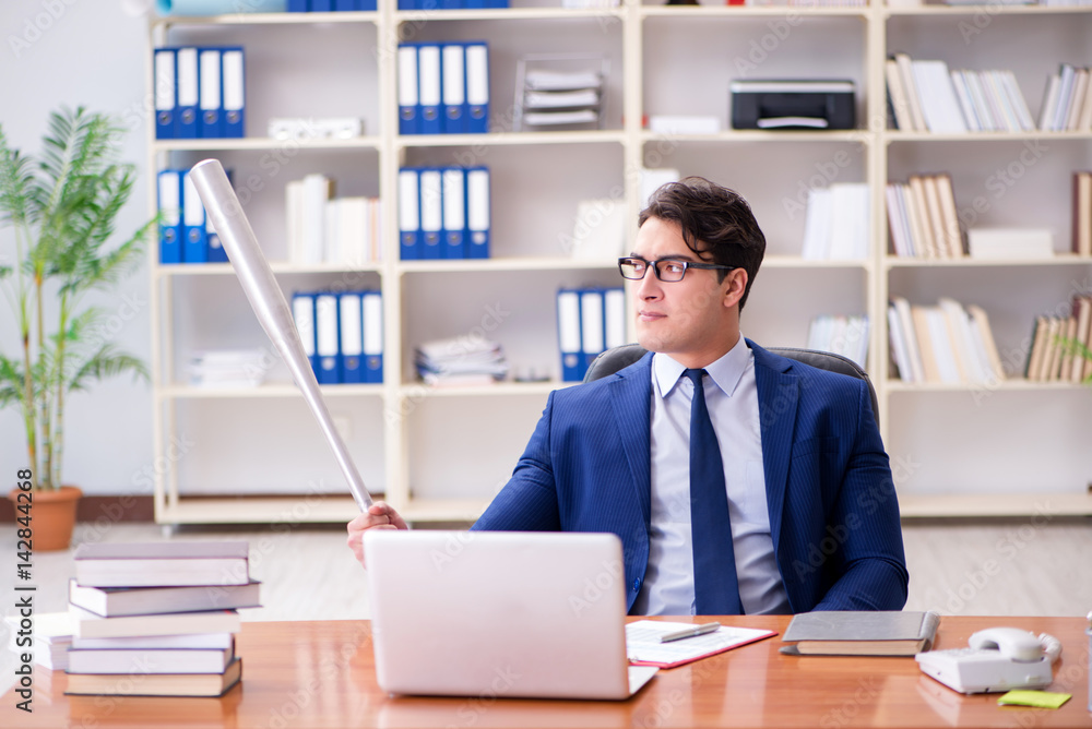 Angry aggressive businessman in the office Angry aggressive businessman in the office
