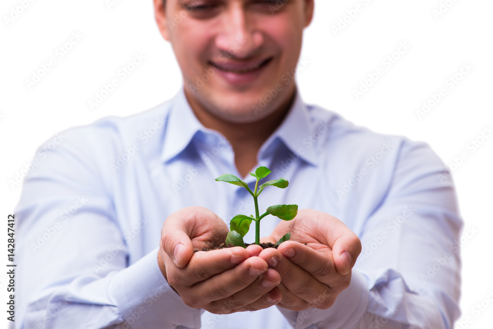 Man holding green seedling isolated on white Man holding green seedling isolated on white