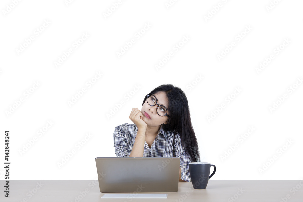 Businesswoman is thinking of idea on studio Businesswoman is thinking of idea on studio