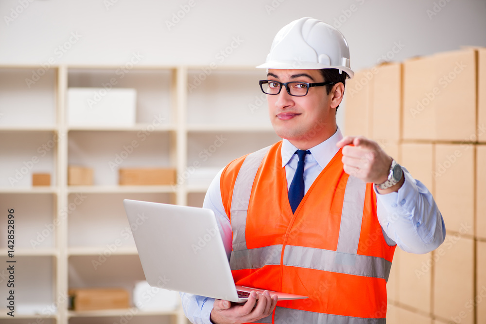 Man working in postal parcel delivery service office Man working in postal parcel delivery service office