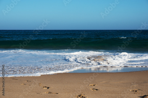 Seascape of calm ocean on sunny summer day