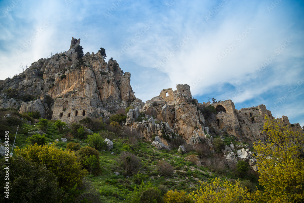 The Saint Hilarion Castle lies on the Kyrenia mountain range, in Cyprus. This location provided the castle with command of the pass road from Kyrenia to Nicosia. Beautiful Castle in the Mountains.