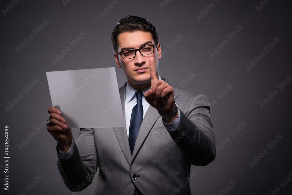 Handsome businessman working on tablet computer Handsome businessman working on tablet computer