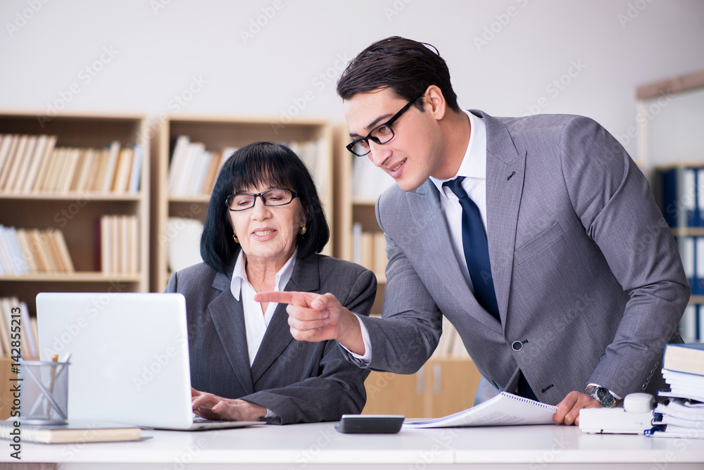 Business couple having discussion in the office Business couple having discussion in the office