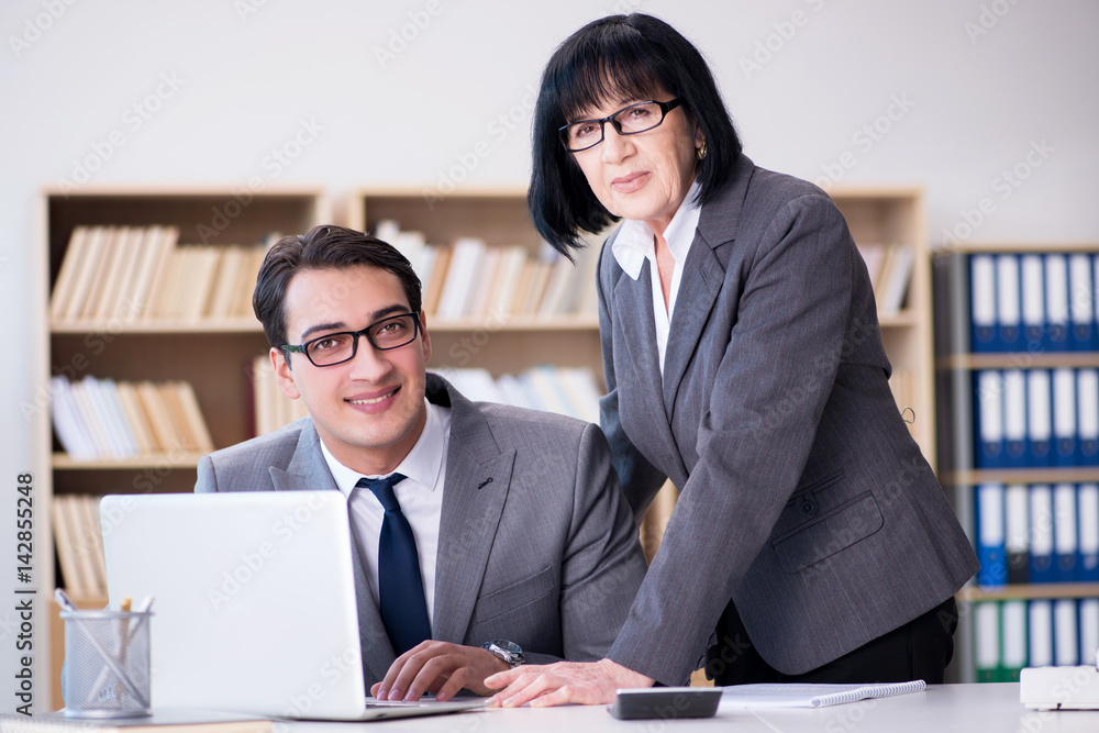 Business couple having discussion in the office Business couple having discussion in the office
