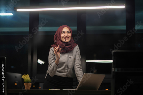 Portrait of young business woman in office
