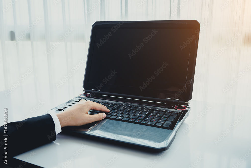 Business woman using laptop computer Business woman using laptop computer