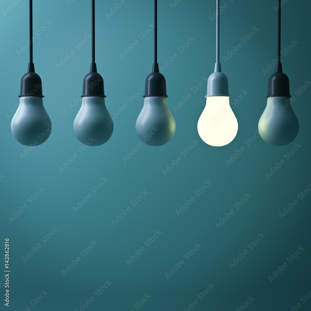One hanging light bulb glowing 
