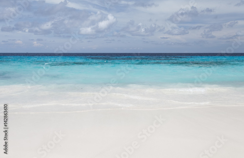 Fototapeta Naklejka Na Ścianę i Meble -  White beach sand and beautiful blue sea and sky