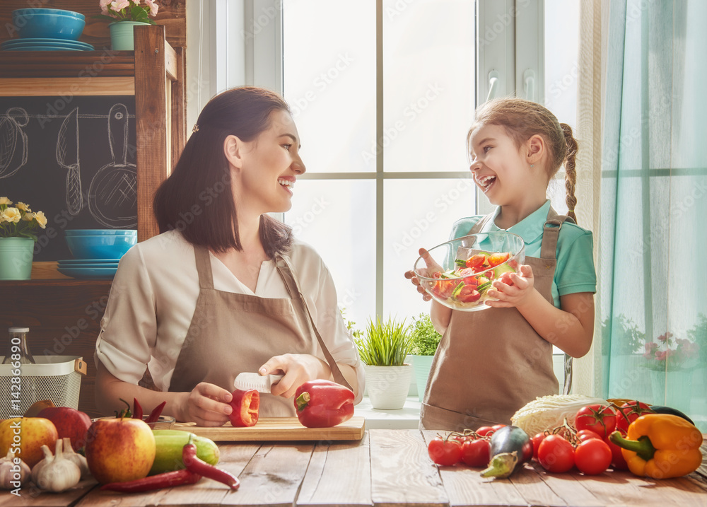 Happy family in the kitchen.