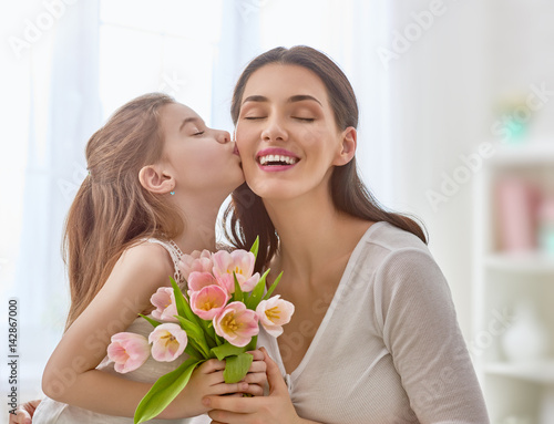 daughter congratulates mom