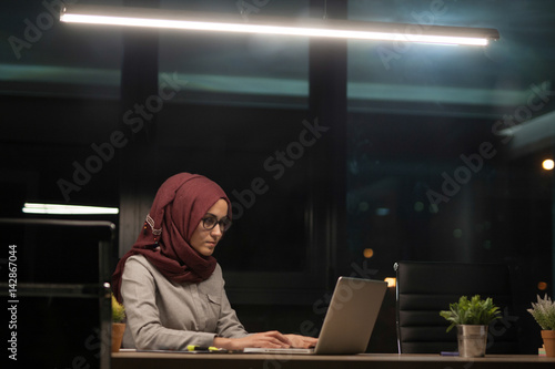 Portrait of young business woman in office