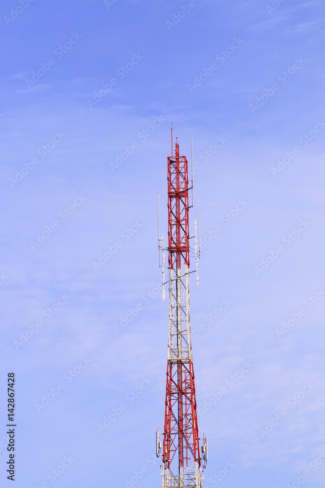 Telecommunication tower red and white antenna radio telephone mobile on sky background Telecommunication tower red and white antenna radio telephone mobile on sky background