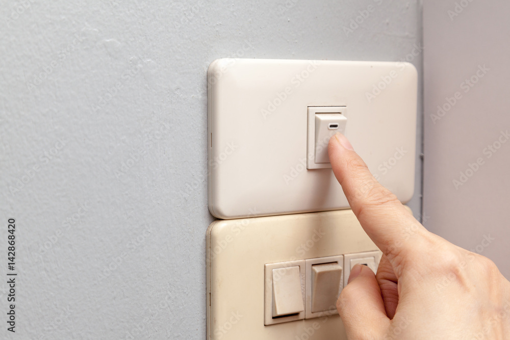 Finger is turning on or off with copy space.