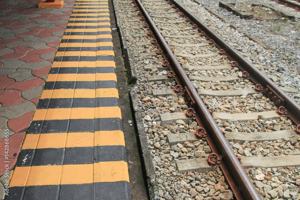 Black and Yellow in train station signal danger : Select focus with shallow depth of field : Black and Yellow in train station signal danger : Select focus with shallow depth of field :