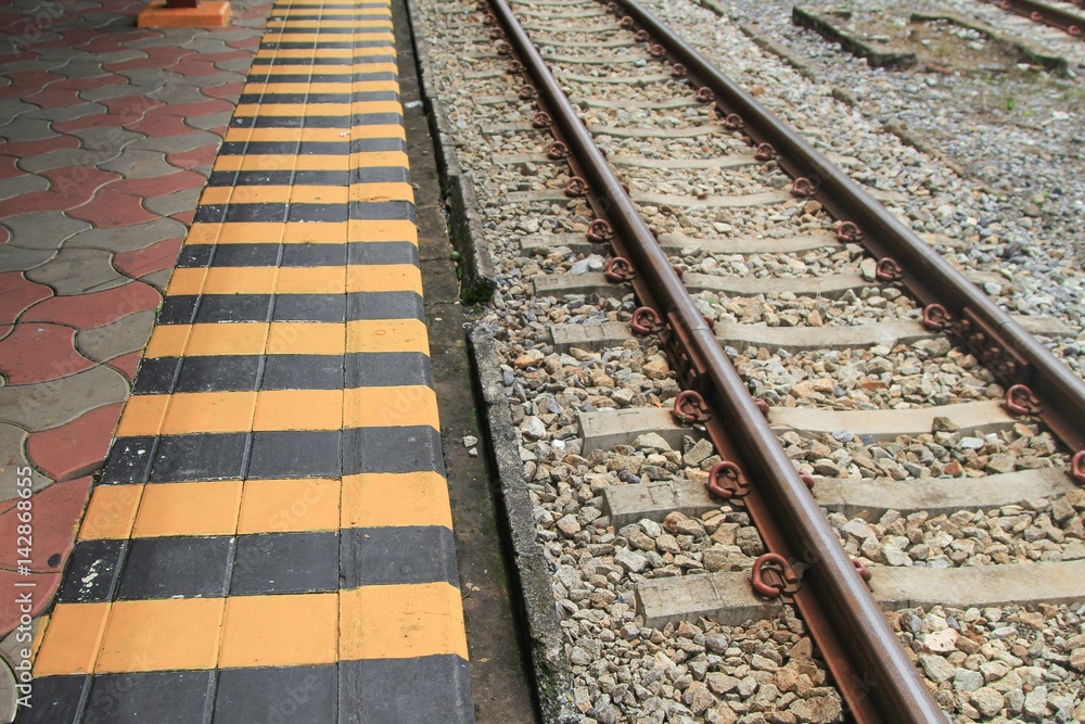 Black and Yellow in train station signal danger : Select focus with shallow depth of field :