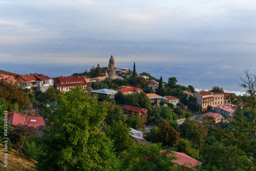 View of houses and old church in Signagi or Sighnaghi city. Georgia