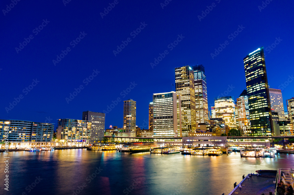 Sydney skyline and Circular Quay ferry station at night