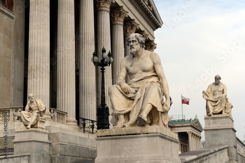 Sculptures of Greek philosophers at the Parliament building of Austria. photo