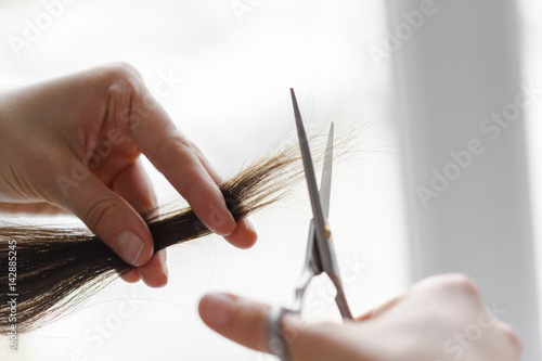 Woman does a haircut