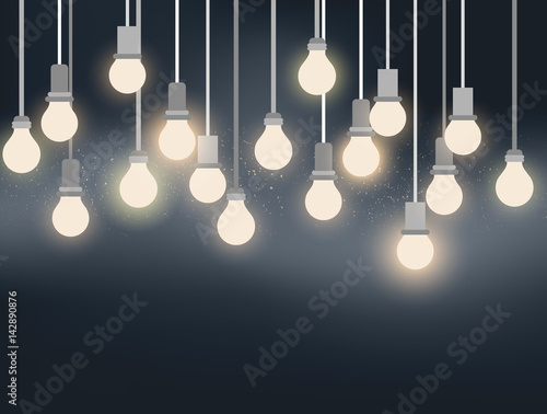 Light bulbs hanging against wall