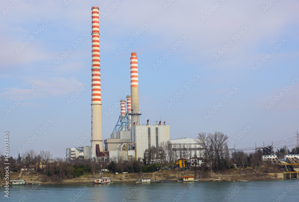 Obraz premium Industrial chimney urban scenery near at power plant