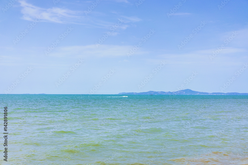 Cloudy sky and turquoise sea in the morning