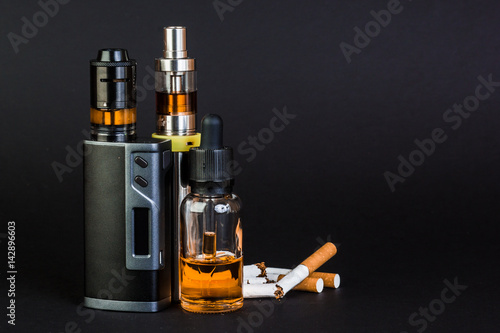 Fotografija Electronic Cigarette on a black background.