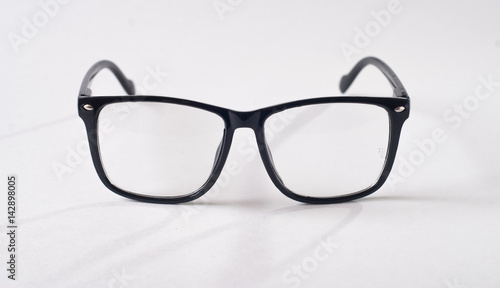 Black glasses on a white background, © vulkanov