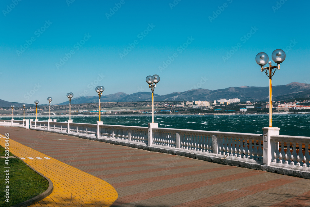 A plot of seaside promenade with a view of the Black Sea and mountains. Gelendzhik, Russia
