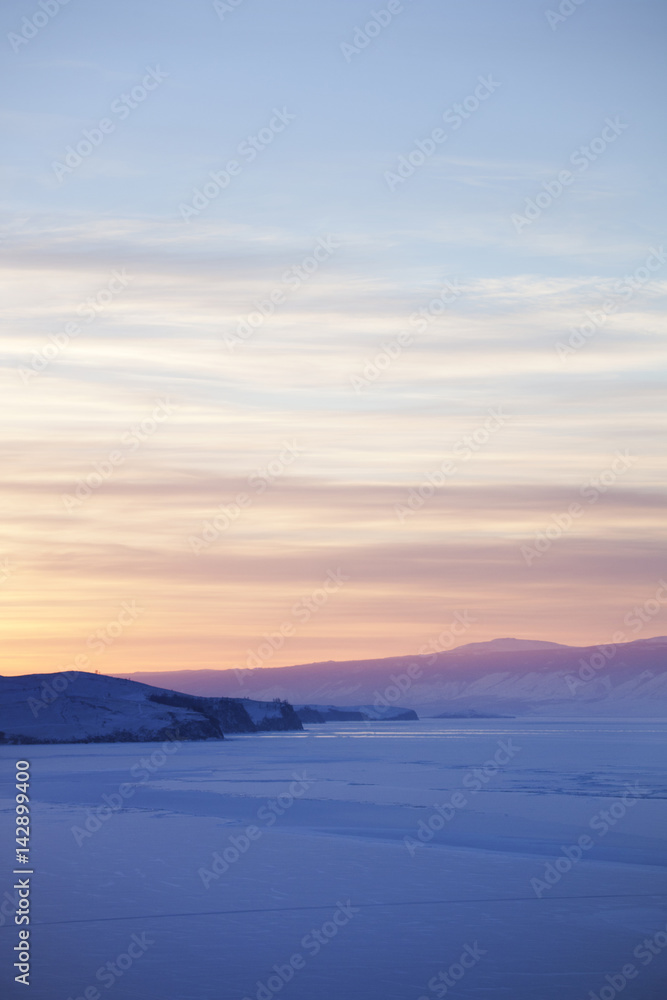 Lake Baikal, winter. Sunset landscape.