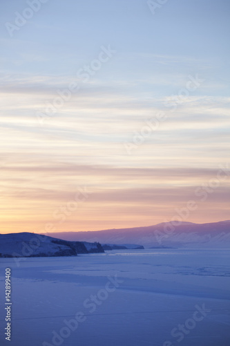 Lake Baikal, winter. Sunset landscape.