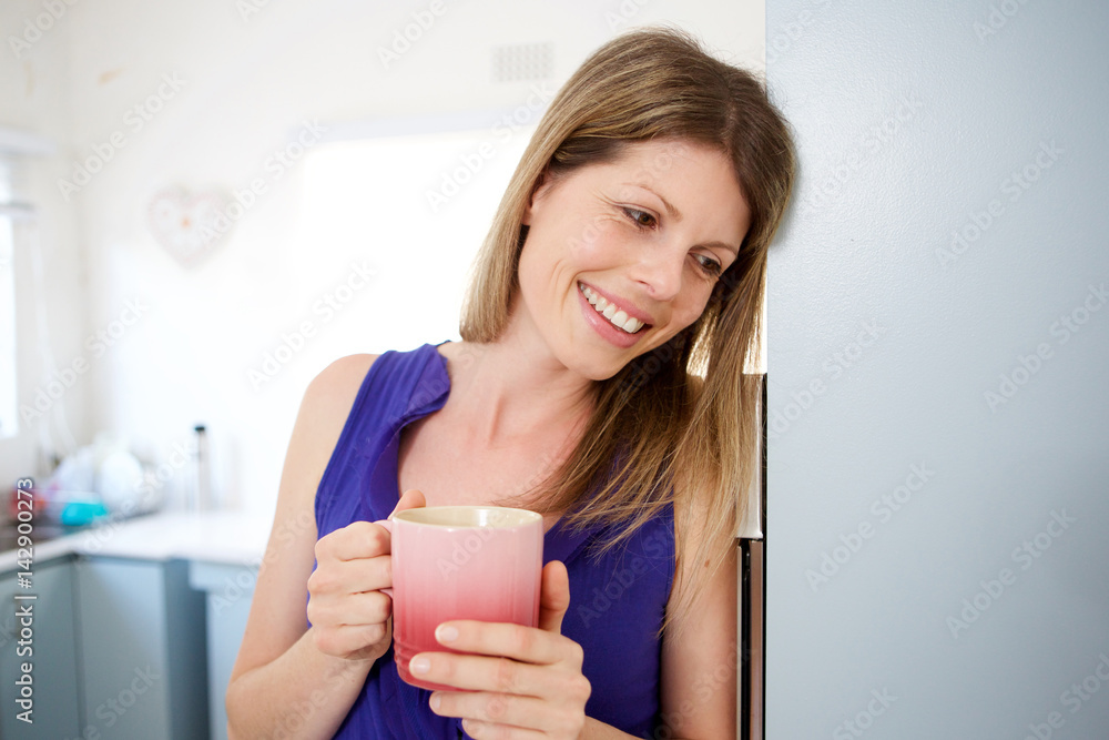 beautiful young woman having coffee at home beautiful young woman having coffee at home