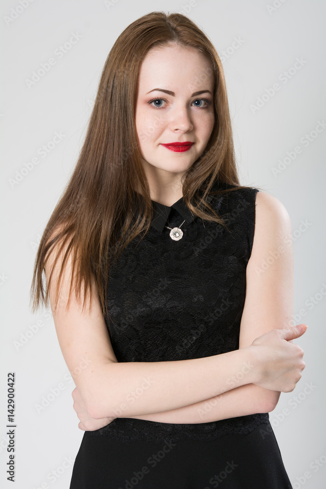 Portrait of a beautiful woman with closed hands. Portrait of a beautiful woman with closed hands.